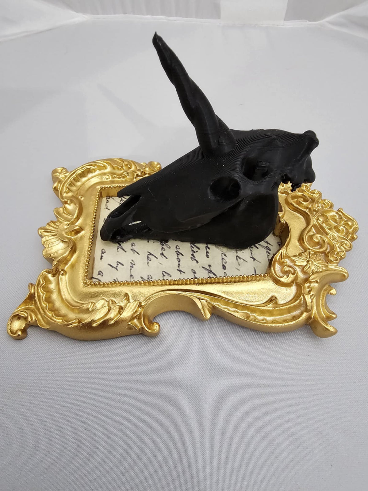 Deadhead - Unicorn Skull, black horn, Gold Frame